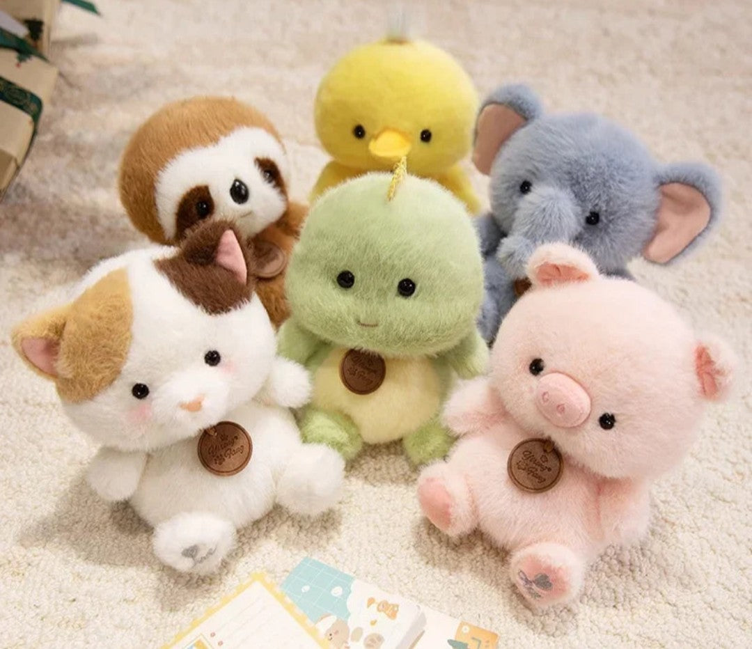 A group of cute plush baby animal toys 